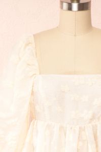Olympe | Cream Babydoll Dress w/ Flowers sold by Boutique 1861