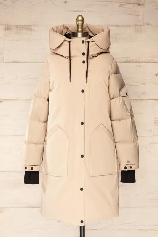 Mikaila Ivory | Knee-Length Quilted Jacket sold by Boutique 1861