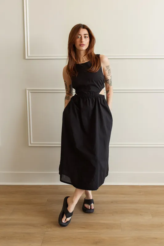 Eleonor | Black Midi Dress w/ Cut-Out sold by Boutique 1861