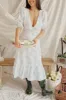 Helike | White Floral Midi Dress sold by Boutique 1861