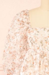 Nicky | Short Floral Beige Babydoll Dress sold by Boutique 1861