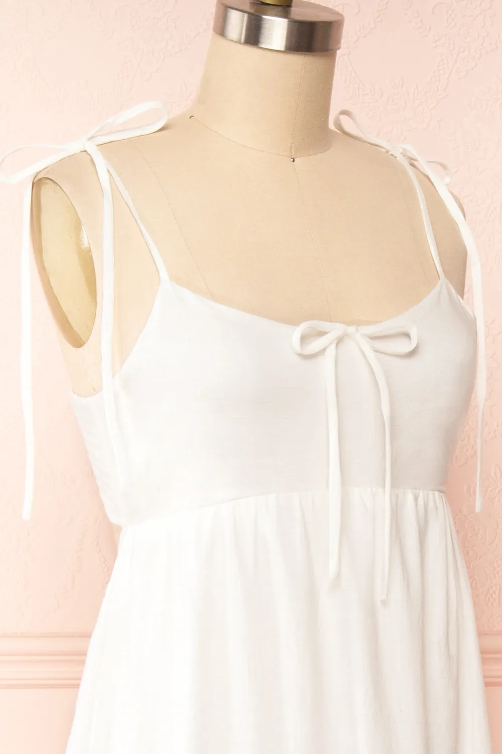 Jennalou | Sleeveless Tiered White Midi Dress sold by Boutique 1861 product image thumbnail 4