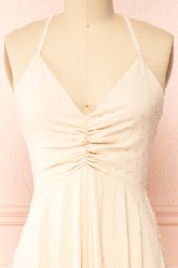 Keila | Asymmetrical Beige Midi Dress sold by Boutique 1861