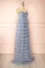 Qila Blue | Strapless Tulle Ruffled Dress sold by Boutique 1861