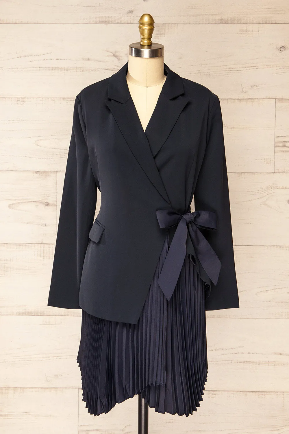 Surrey | Asymmetrical Navy Pleated Blazer Dress sold by Boutique 1861