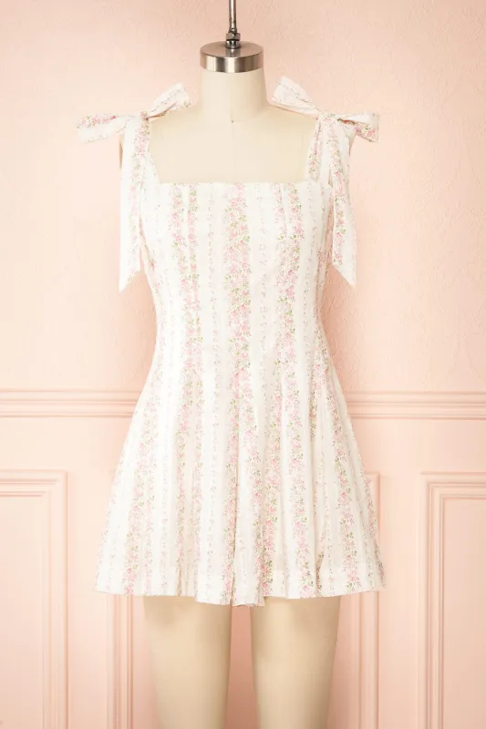 Nayeon Pink | Floral Romper w/ Bow Straps sold by Boutique 1861