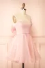 Heejin | Blush Organza Mini Dress with Back Bow sold by Boutique 1861