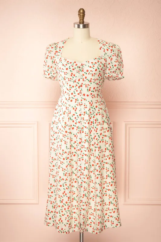 Akkos | Short Sleeve Midi Dress w/ Orange Pattern sold by Boutique 1861