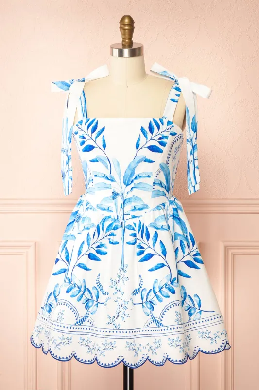 Rayanne White | Short Dress w/ Blue Leaves Print sold by Boutique 1861
