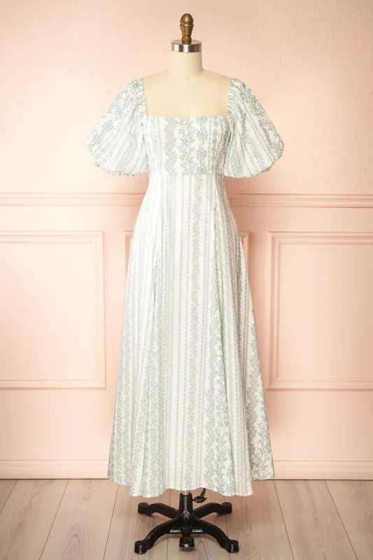 Bachira Blue | Long Floral Dress with Back Tie and Pockets sold by Boutique 1861