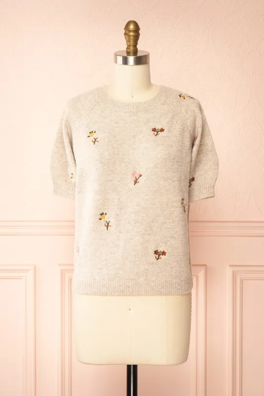 Furiosa | Beige Knit Top with Embroidered Flowers sold by Boutique 1861