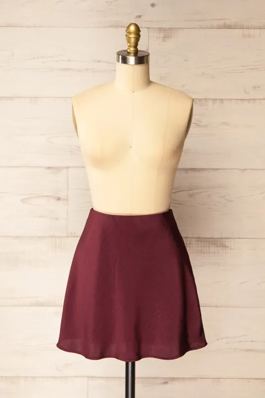 Tesselle | Short Burgundy Satin Skirt sold by Boutique 1861