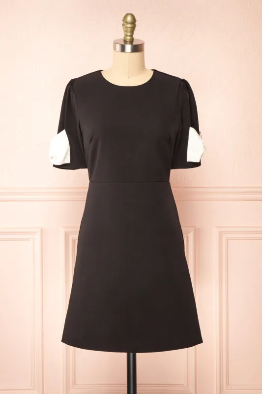 Rosette | Short Black Dress w/ White Bows sold by Boutique 1861