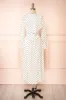 Nordis | Belted Polka-Dot Midi Dress sold by Boutique 1861