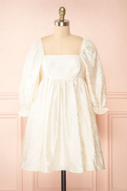 Betie | Ivory Satin Embroidered Babydoll Dress sold by Boutique 1861