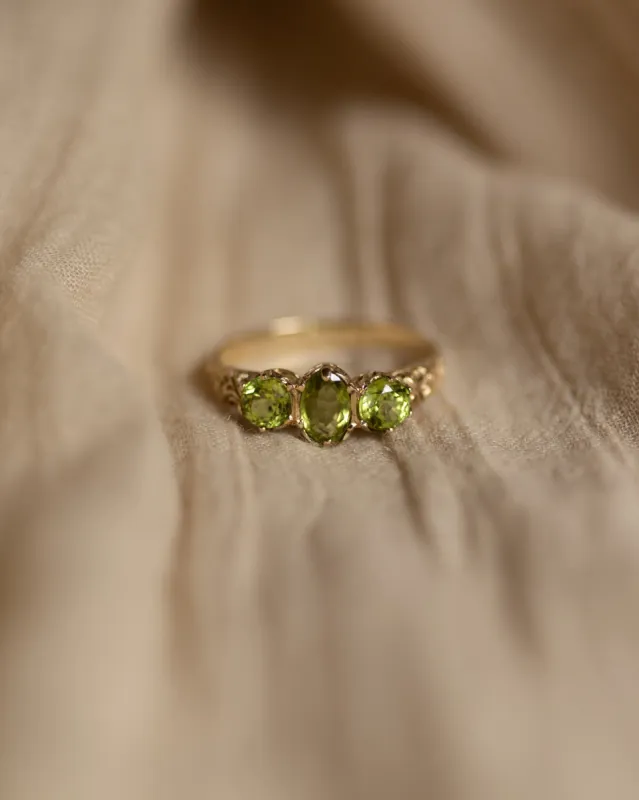 Jessamine 1993 Vintage 9ct Gold Peridot Trilogy Ring sold by Rock n Rose