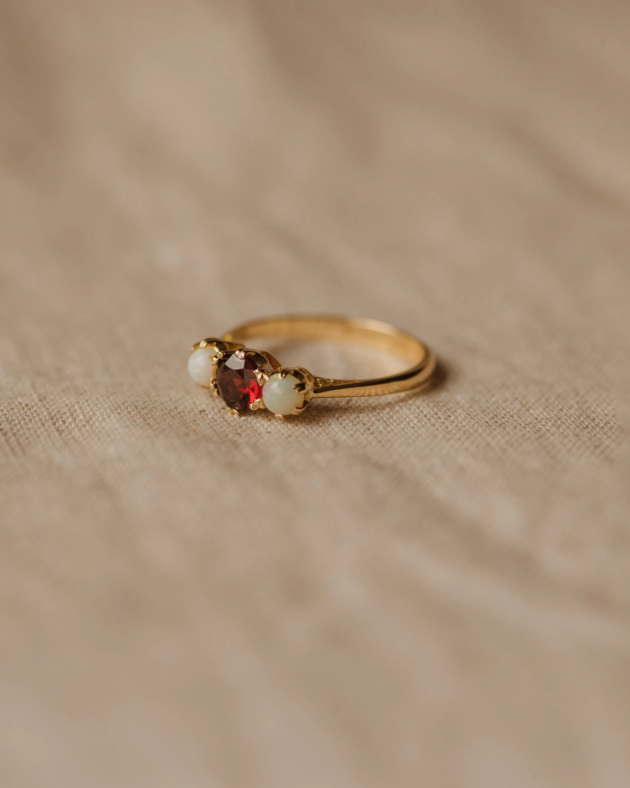 Iris 1969 9ct Gold Garnet & Opal Trilogy Ring sold by Rock n Rose product image thumbnail 4