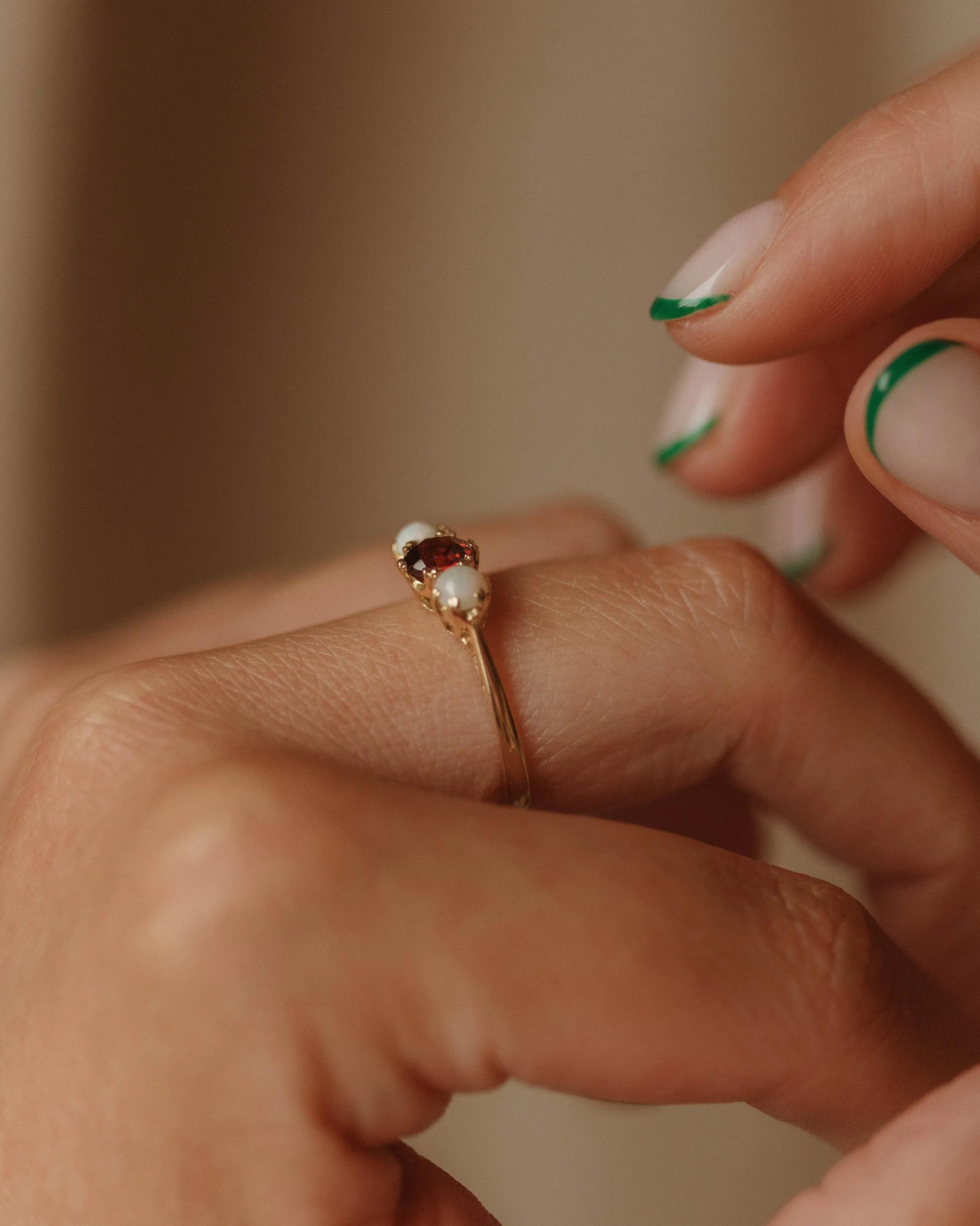 Iris 1969 9ct Gold Garnet & Opal Trilogy Ring sold by Rock n Rose product image thumbnail 2