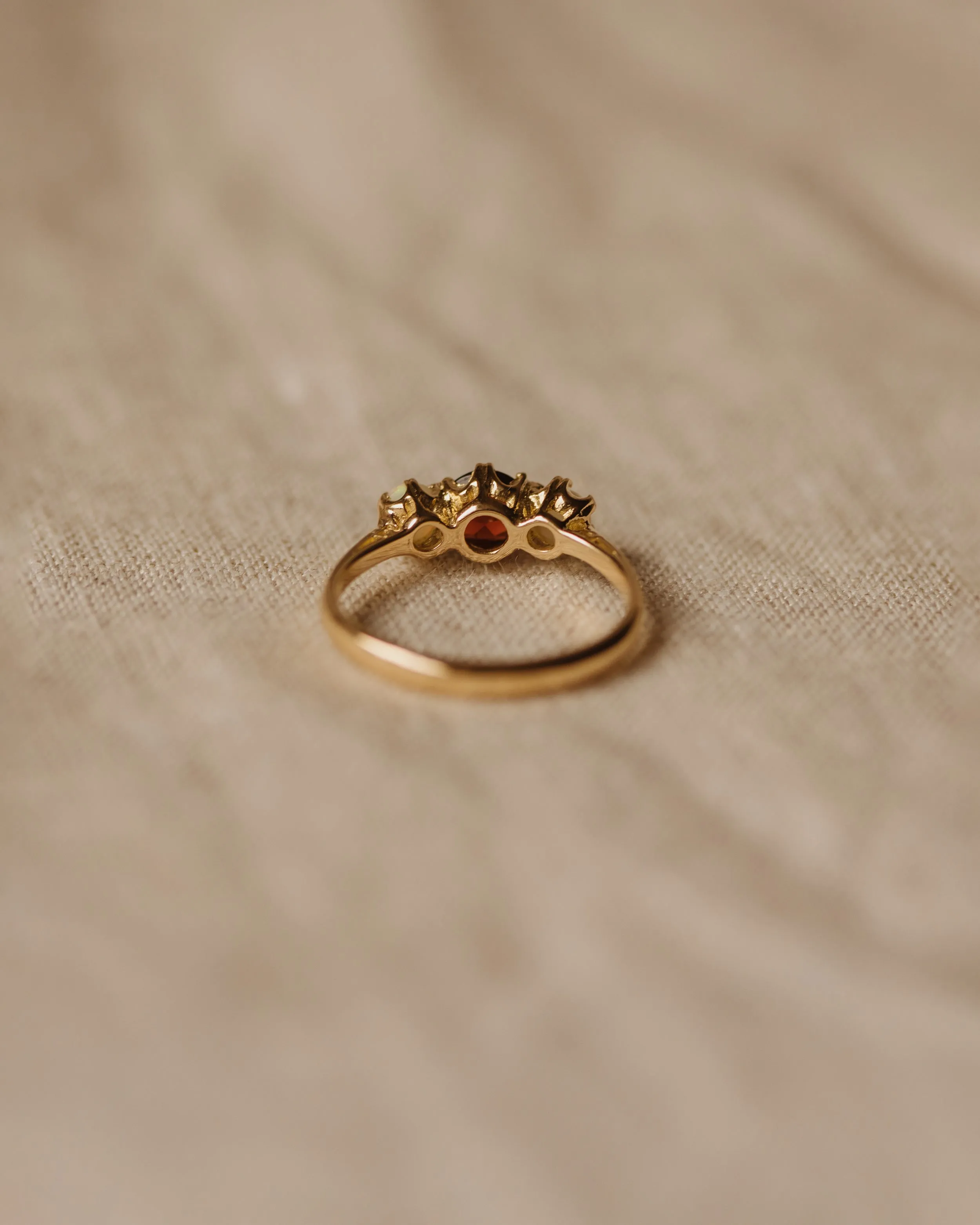 Iris 1969 9ct Gold Garnet & Opal Trilogy Ring sold by Rock n Rose product image thumbnail 5