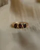 Betina Antique 9ct Gold Garnet Trilogy Ring sold by Rock n Rose