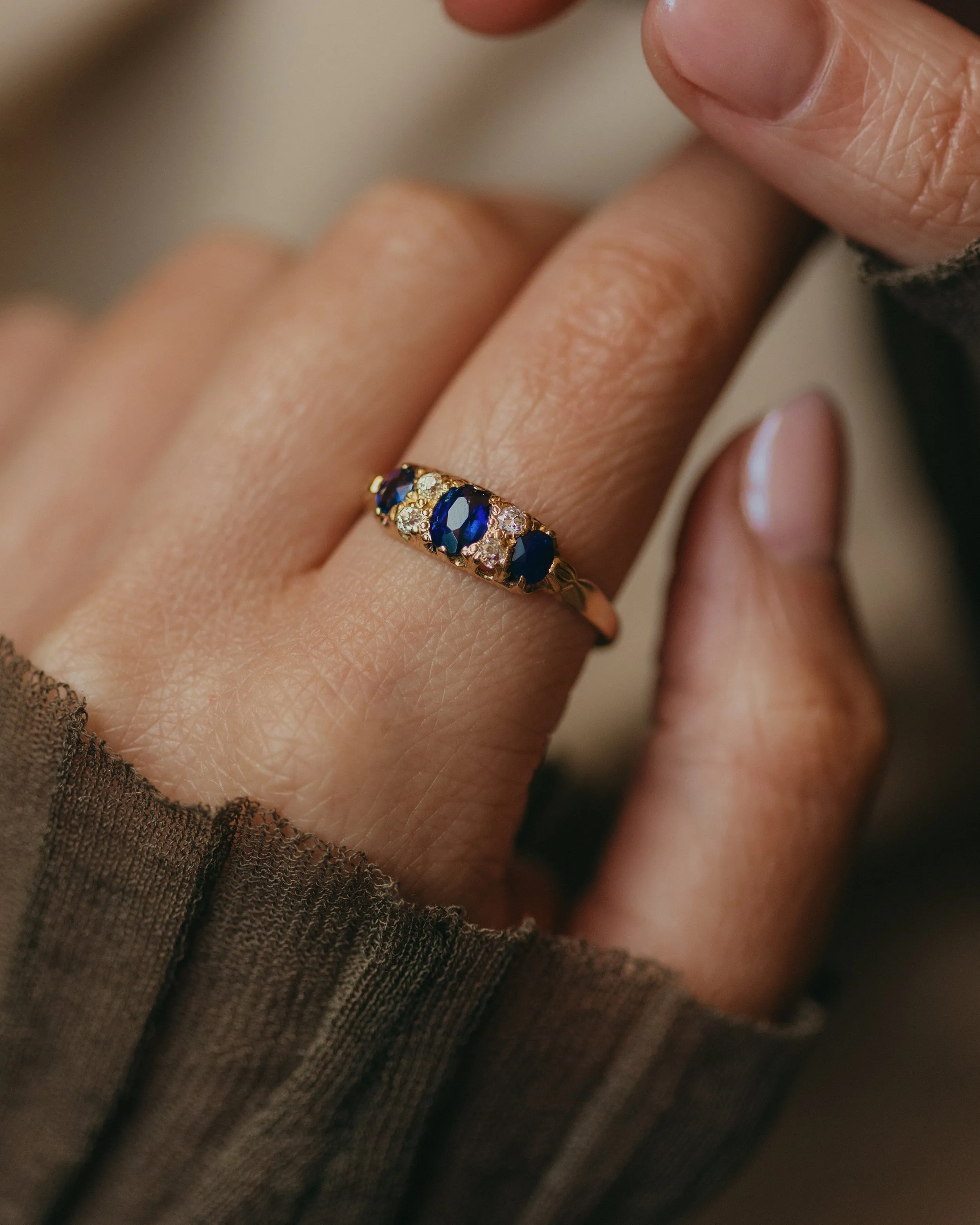 Lillian 1945 Vintage 18ct Gold Sapphire & Diamond Seven Stone Ring sold by Rock n Rose