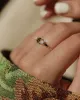 Selma Vintage 9ct Gold Blue Topaz & Diamond Trilogy Ring sold by Rock n Rose