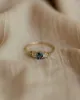Selma Vintage 9ct Gold Blue Topaz & Diamond Trilogy Ring sold by Rock n Rose