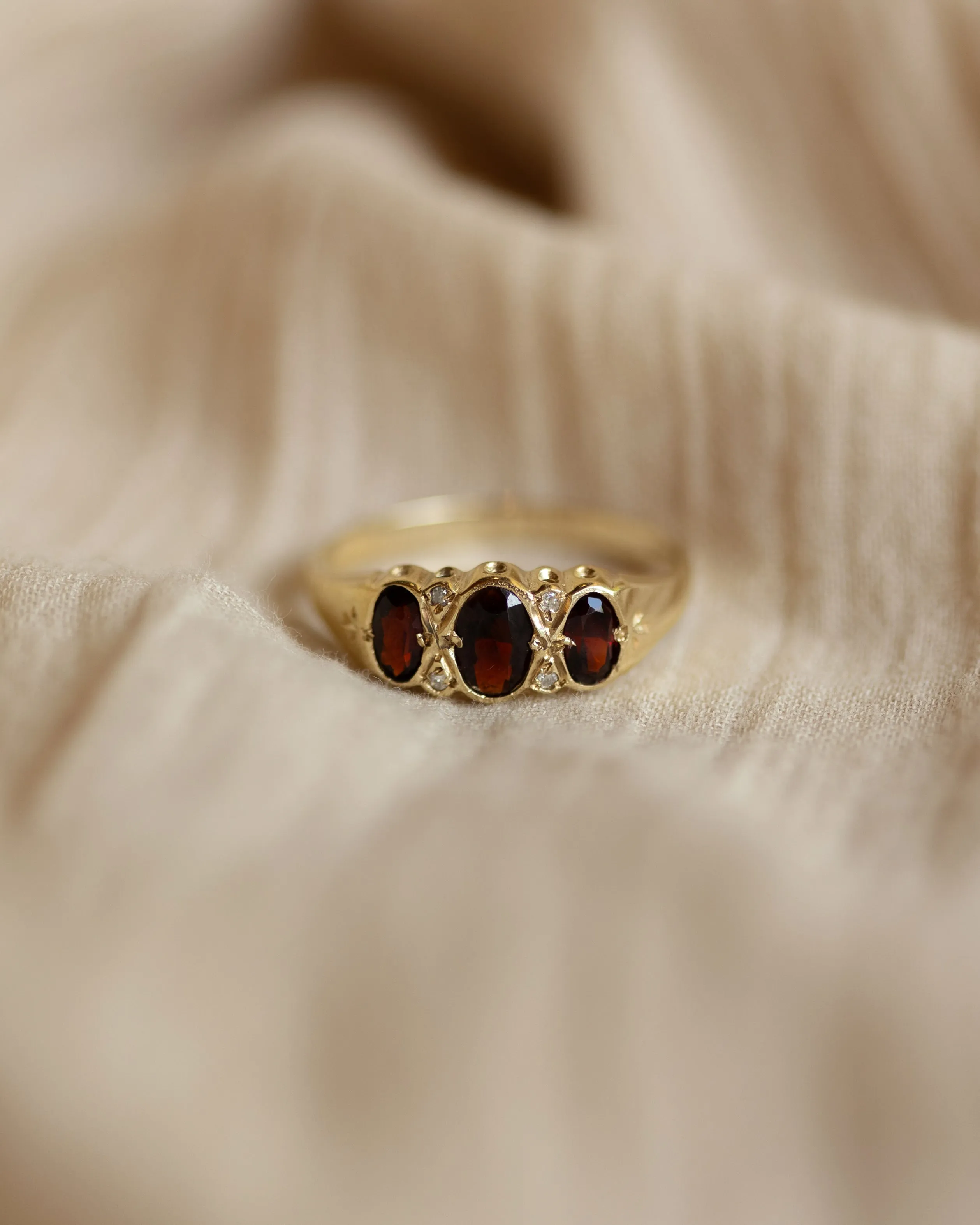 Winona 1989 Vintage 9ct Gold Garnet & Diamond Trilogy Ring sold by Rock n Rose product image thumbnail 3