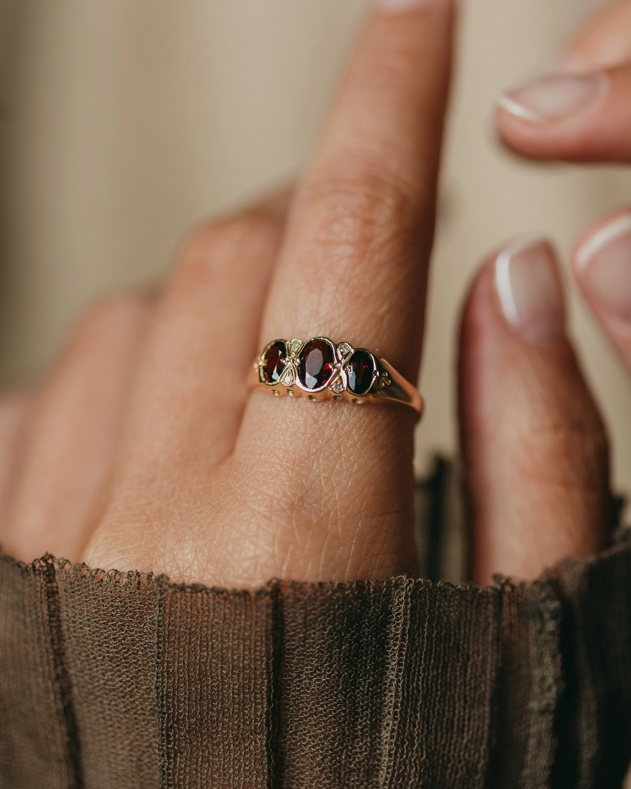 Winona 1989 Vintage 9ct Gold Garnet & Diamond Trilogy Ring sold by Rock n Rose