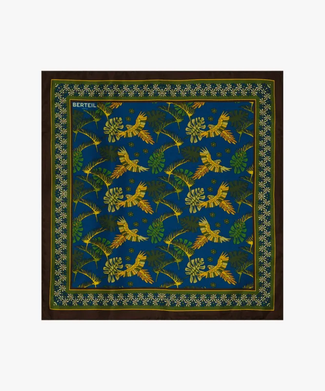 Blue macaw silk clutch made by Berteil