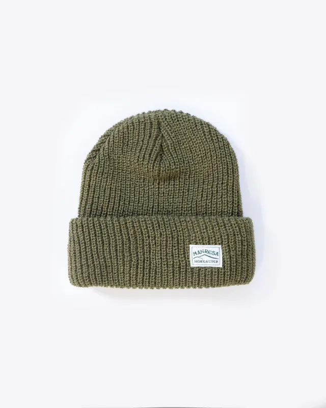The Watch Cap Beanie in Olive sold by Manresa