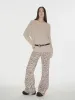 "Warm Women's Formula" French simple and versatile merino wool blended one-neck off-the-shoulder sweater sold by Firelady Sheepskin