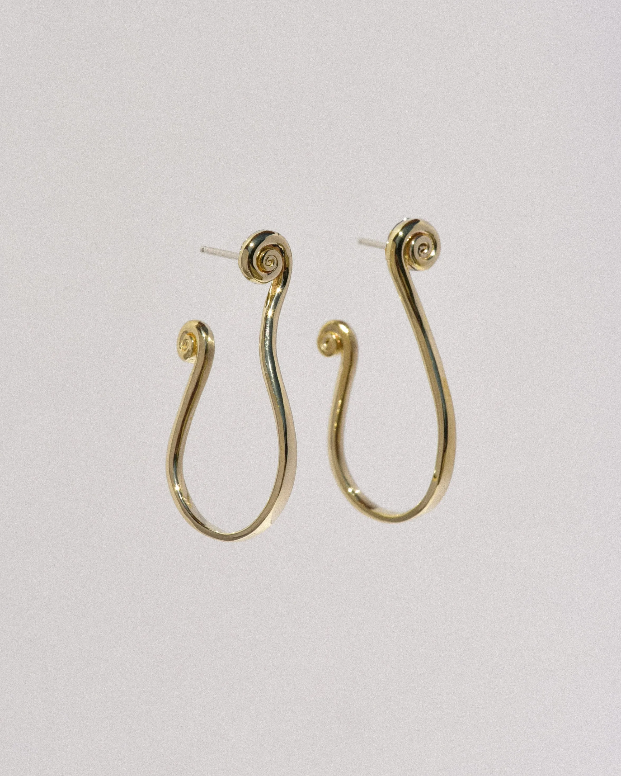 Brass Fern Hoops sold by Leigh Miller