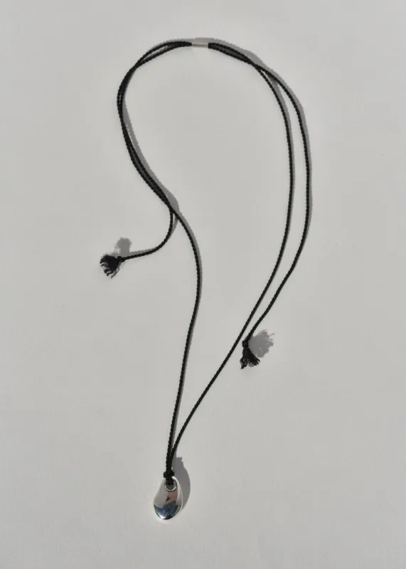 Sea Stone Pendant on Silk Cord sold by Leigh Miller