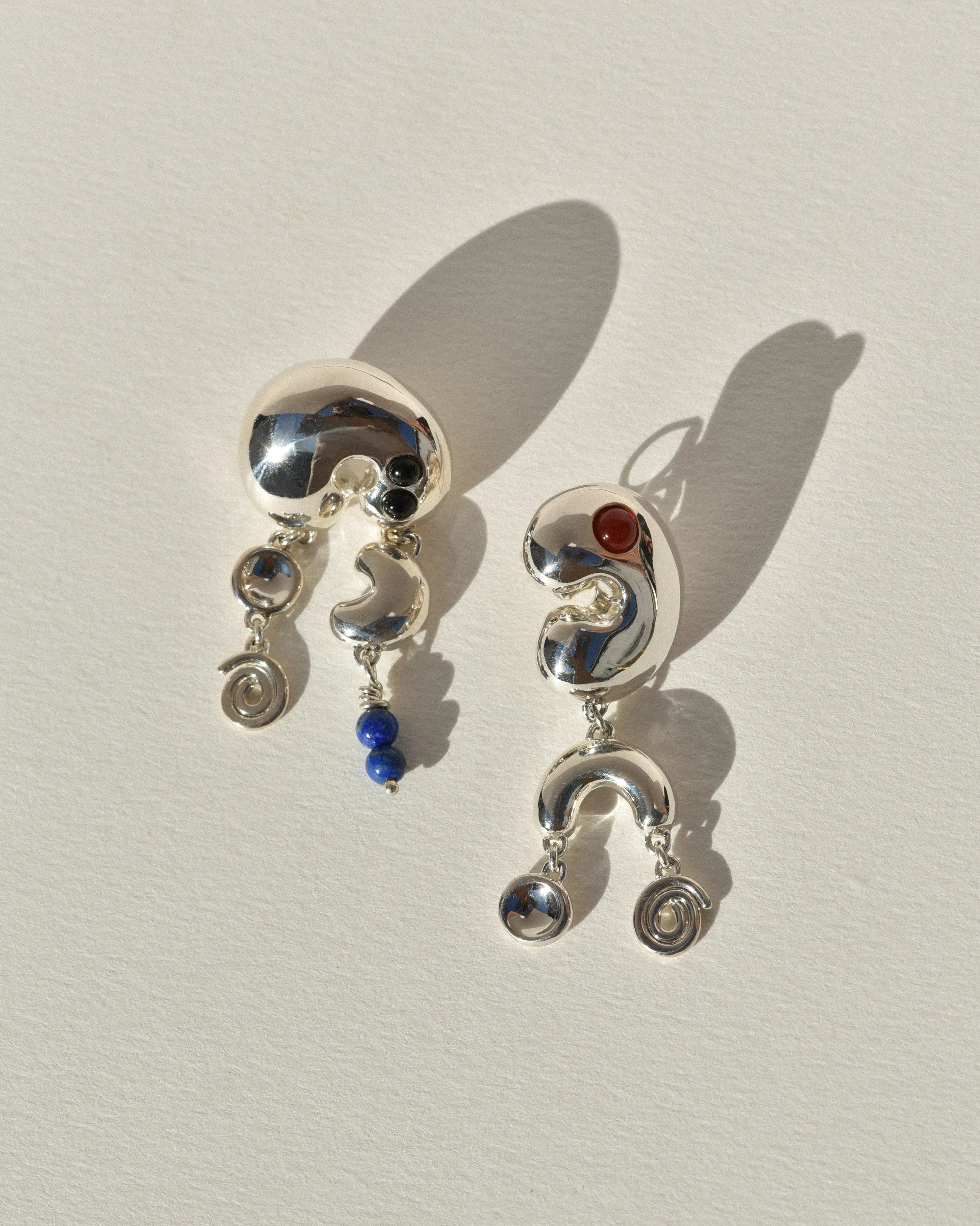 Sterling Silver Doodad Dangles sold by Leigh Miller