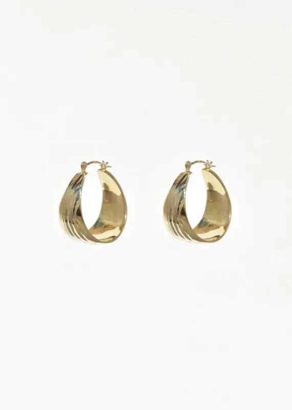 Brass Roseau Hoops sold by Leigh Miller