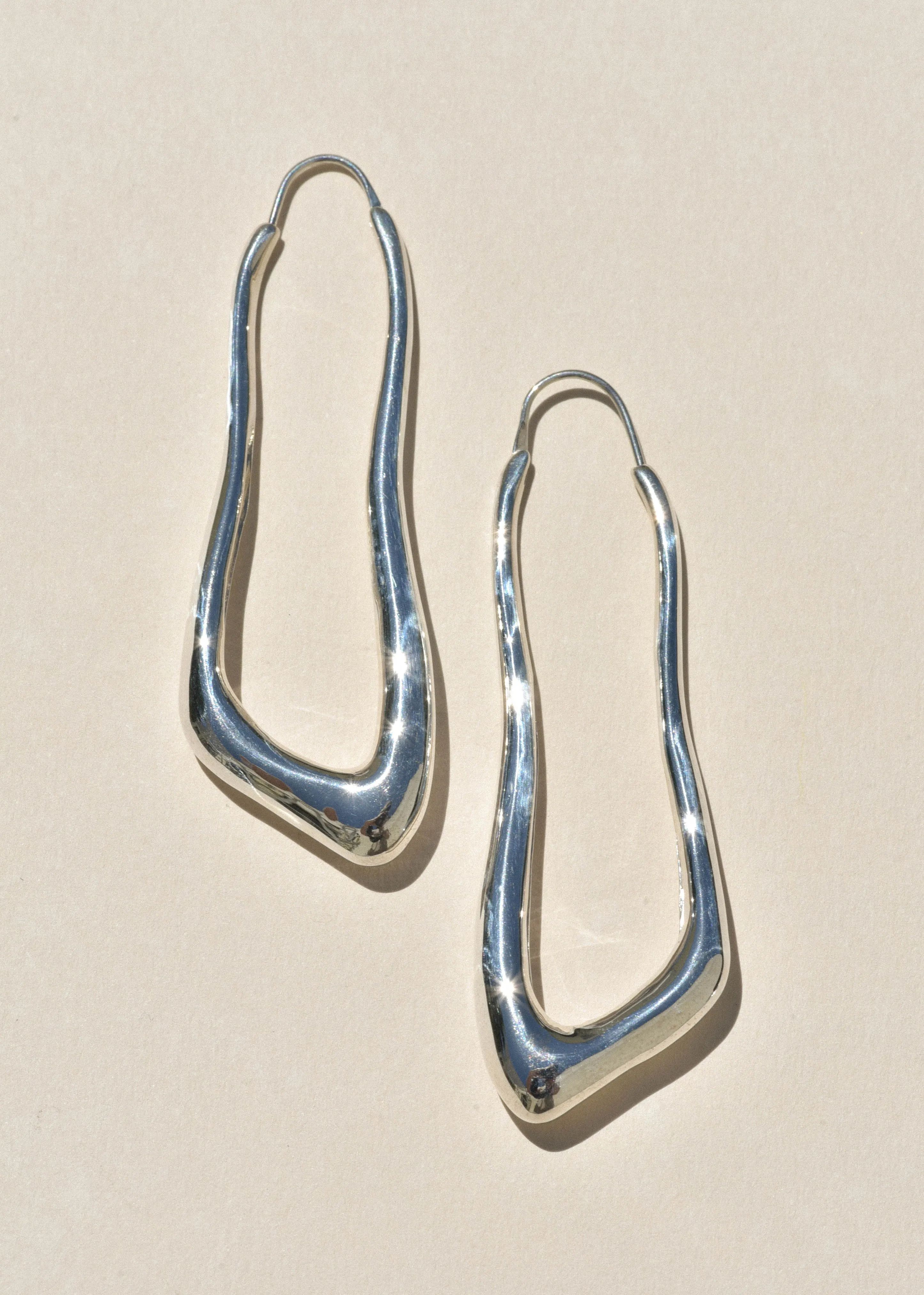 Sterling Silver Lanky Hoops sold by Leigh Miller