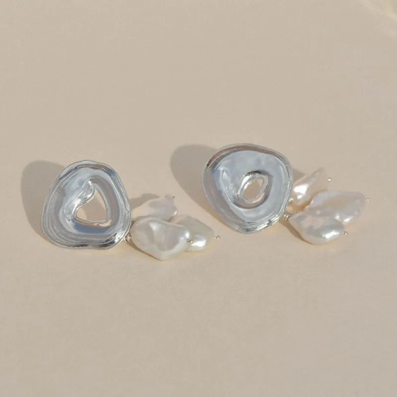 Sterling Silver Castanet Earrings sold by Leigh Miller