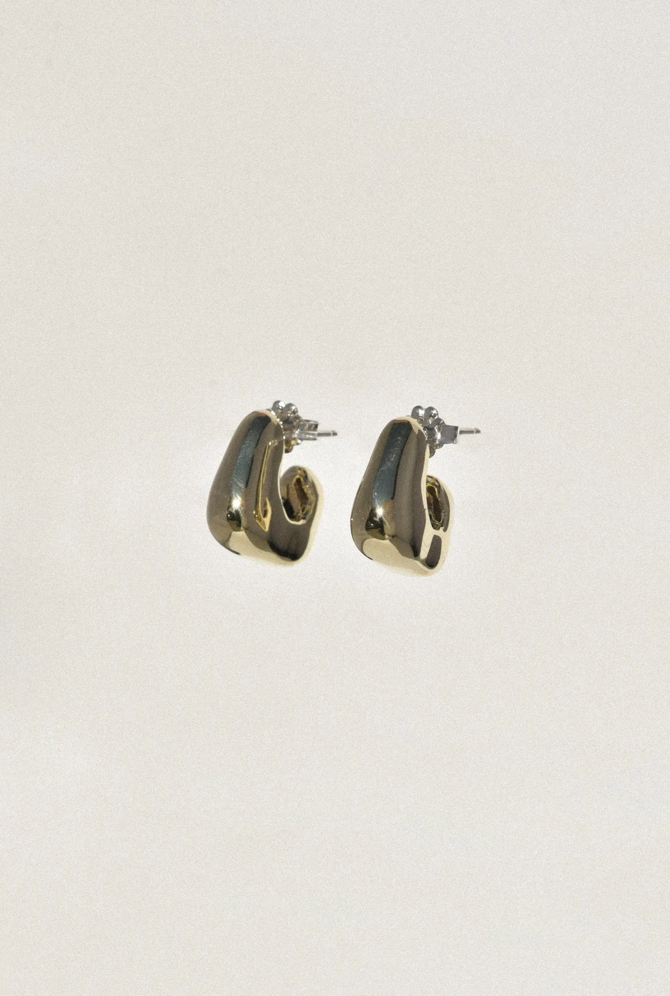 Brass Puff Hoops sold by Leigh Miller