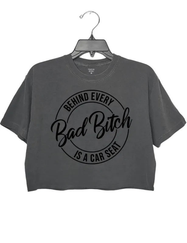 Behind Every Bad Bitch Is A Car Seat Crop Top sold by Topic Girl