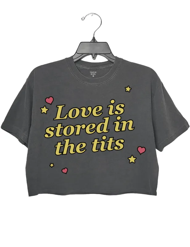 Love ls Stored In The Tits Crop Top sold by Topic Girl