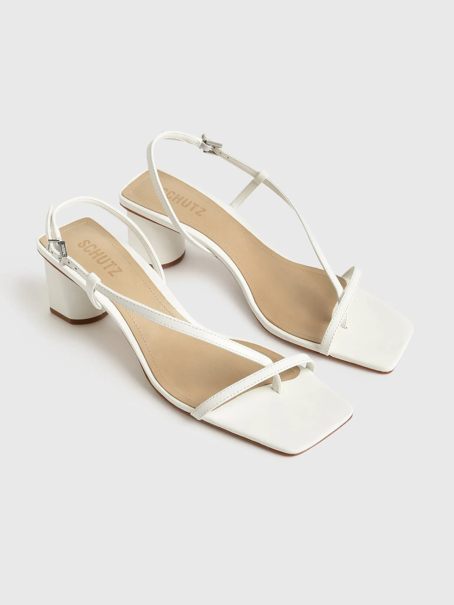 Schutz Women's Heloise Mid Block Heel Leather Sandal sold by Saint Bernard