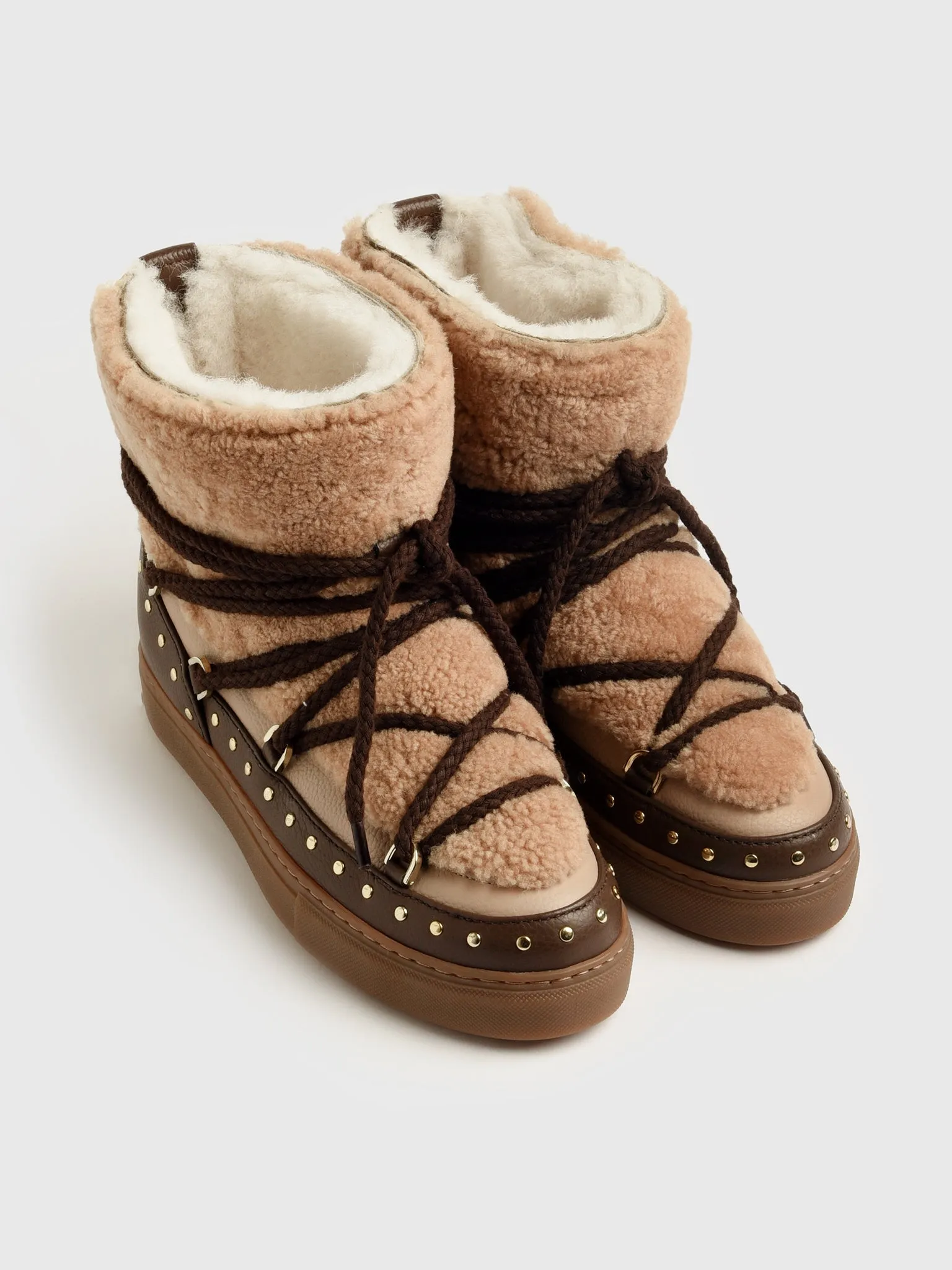 Inuikii Women's Curly Rock Boot sold by Saint Bernard