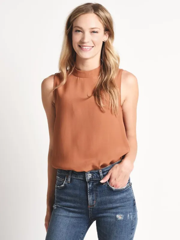 Naked Zebra Mock Neck Curved Hem Top sold by Saint Bernard