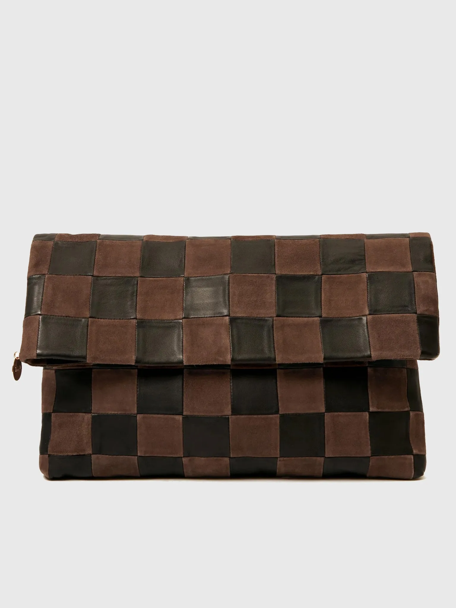 Clare V. Carryall Tab Clutch sold by Saint Bernard