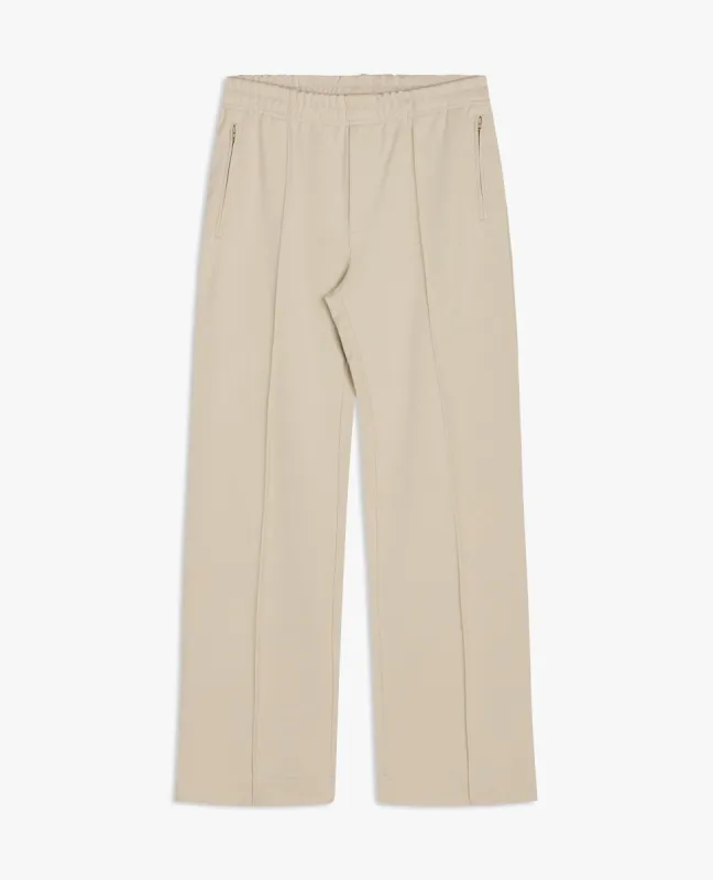 TRACK PANTS . OYSTER sold by Sunflower
