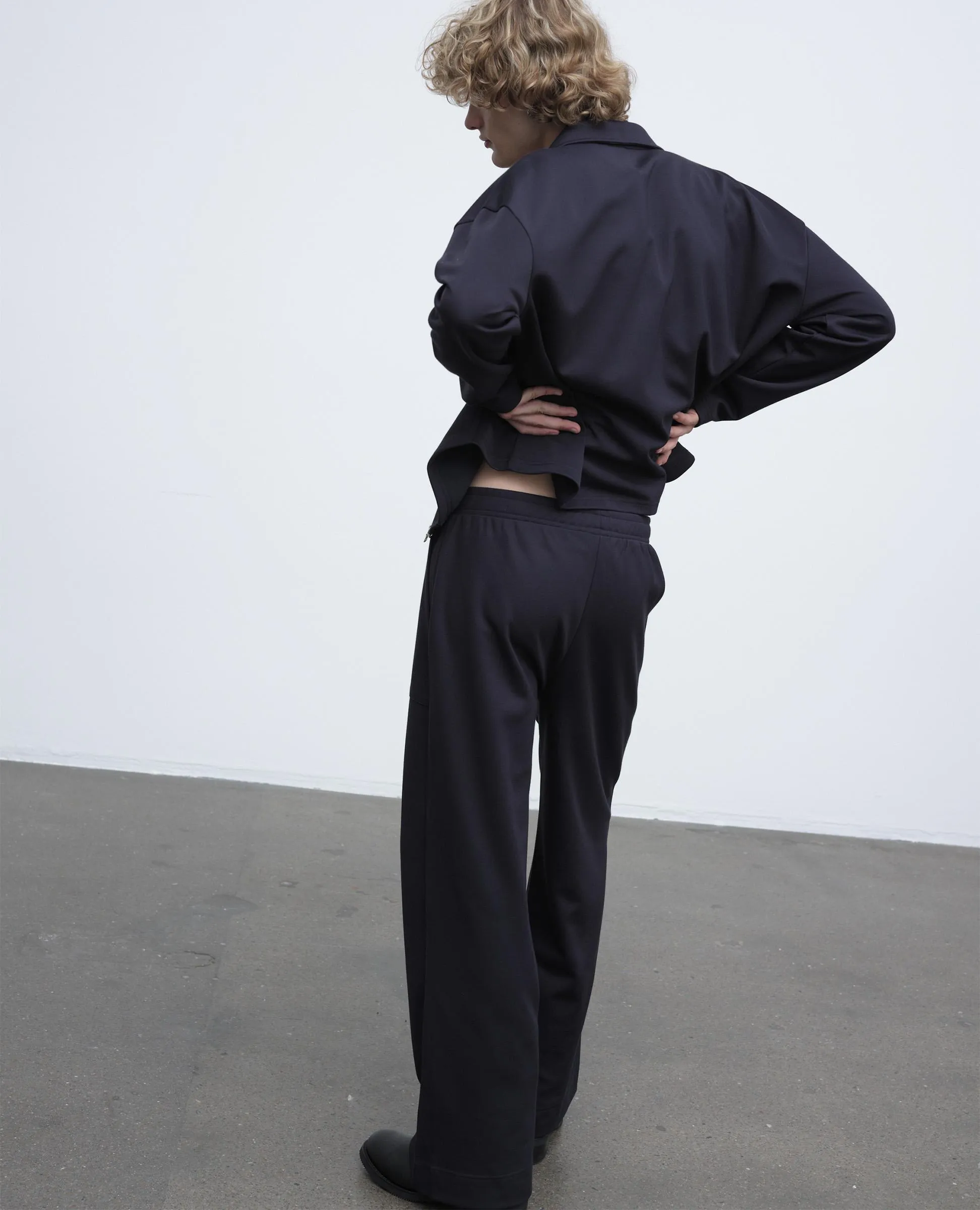 TRACK PANTS . NAVY sold by Sunflower