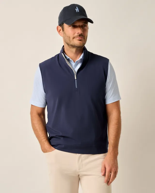The Motion 1/4 Zip Performance Vest made by Johnnie-O