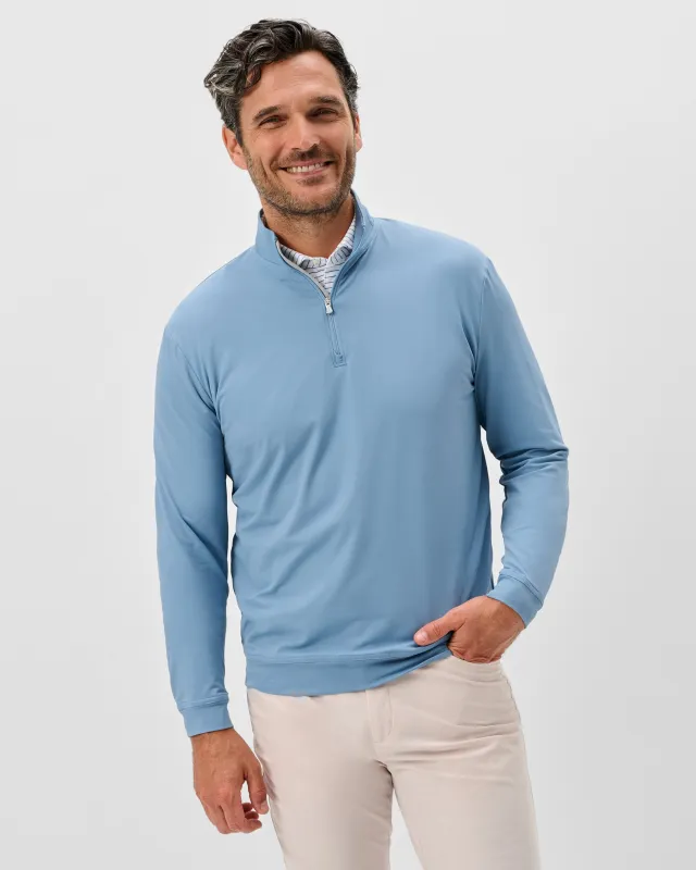 Motion Performance 1/4 Zip made by Johnnie-O