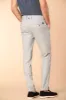 Milano men's chino pants in mouliné cotton with micro pattern extra slim fit sold by Mason's